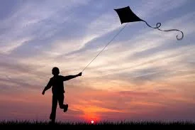 backlit-child-with-kite.jpg