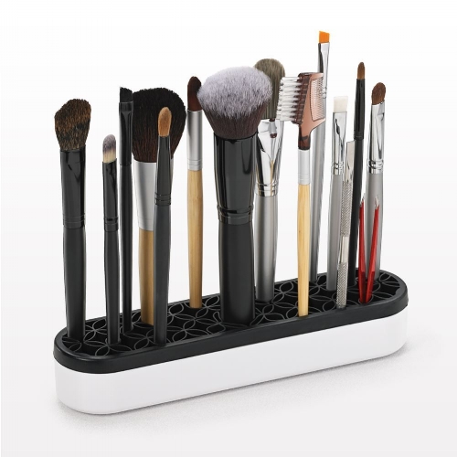  Beauty Organizer and Display: This beauty tool organizer is perfect for displaying makeup brushes, lipsticks, tweezers and more. The flexible silicone allows items of almost any size to be stored neatly and upright for easy access.
