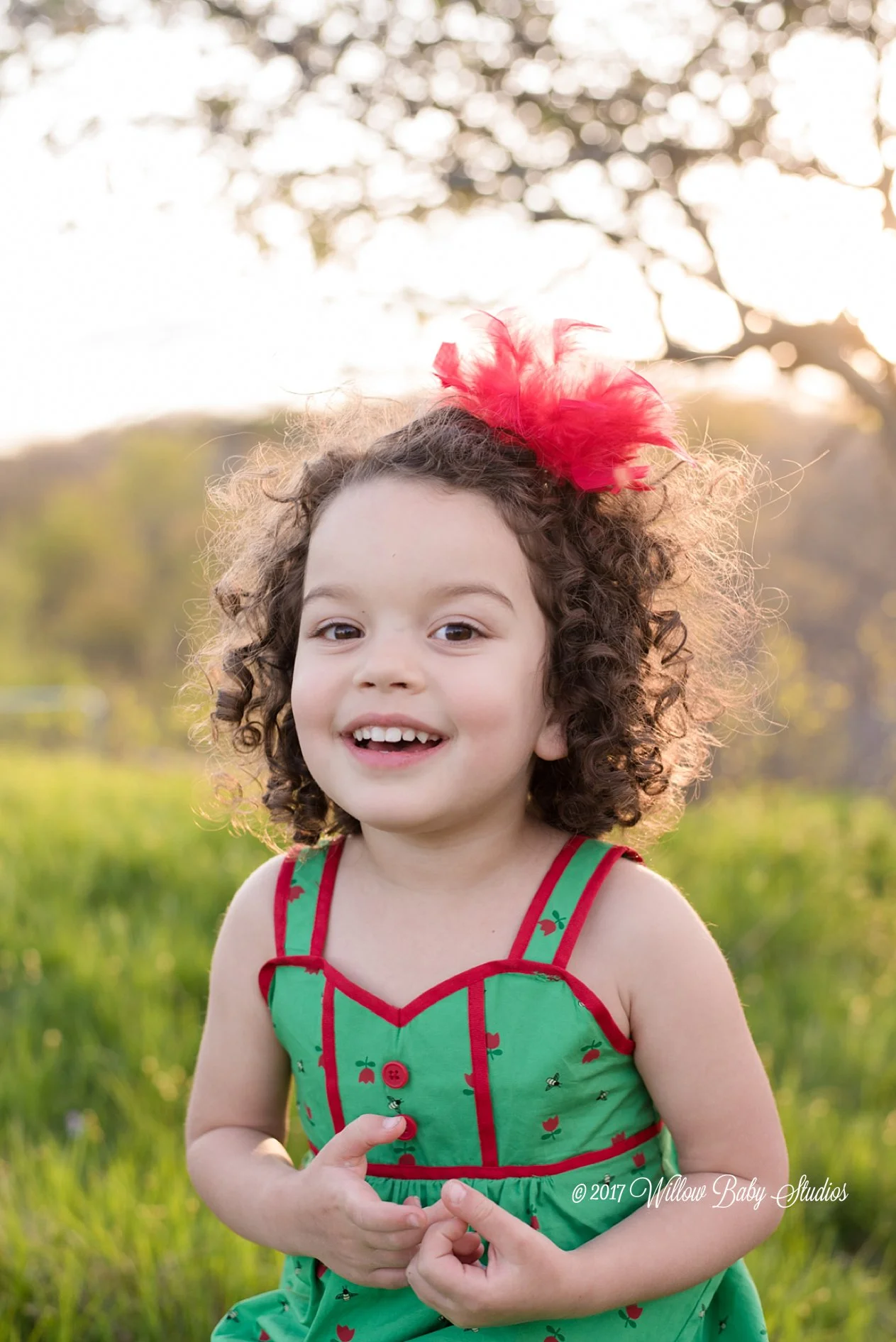 curly-haired-smiling-girl-spring-evening