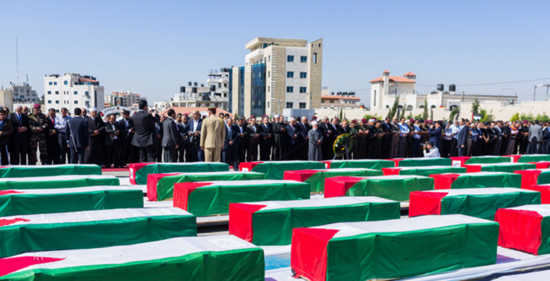 Official ceremony in Ramallah for the remains of Palestinians given back by Israel, May 2012. Photo by Lazar Simeonov.