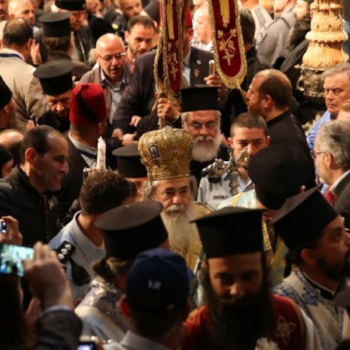 Greek Orthodox Patriarch of Jerusalem Theophilos III leads the Orthodox Easter ceremony of the 'Holy Fire' in the Church of the Holy Sepulchre in Jerusalem's Old City on April 15, 2017. (AFP/Gali Tibbon)