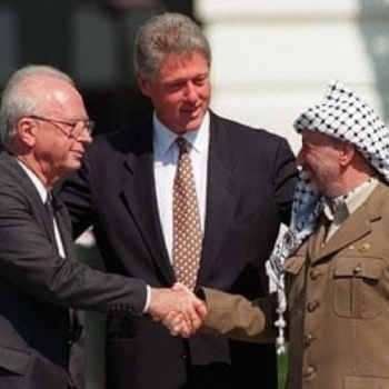 Israeli PM Yitzhak Rabin and PLO President Yasser Arafat signed the Oslo Accords with US President Bill Clinton on September 13, 1993 at the White House