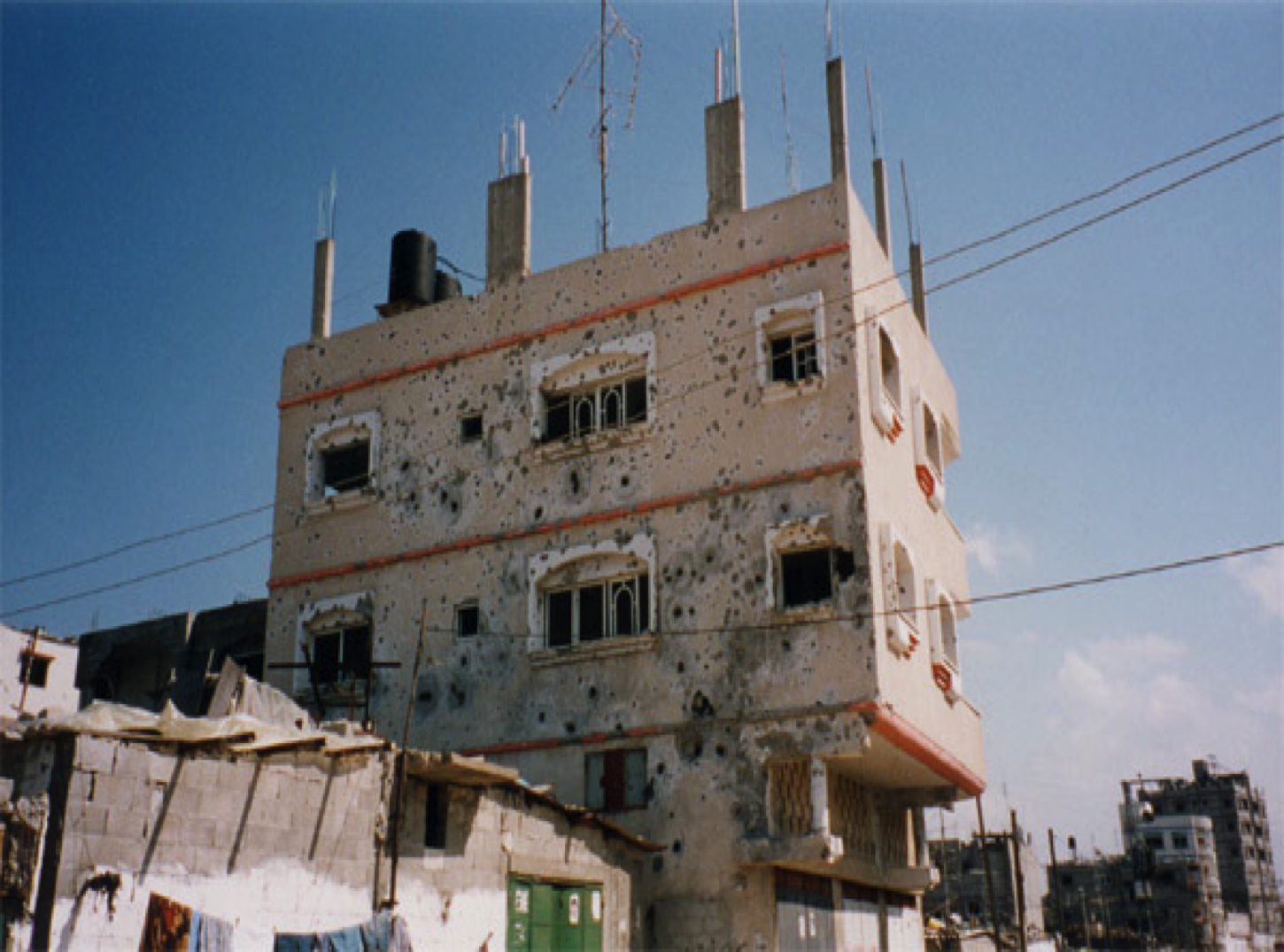 Apartment building in Gaza, photo by Alison Weir.
