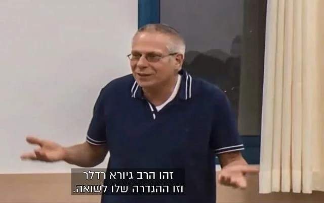 Rabbi Giora Redler, a teacher at the the pre-military academy in the West Bank settlement in Eli. (screen capture: Channel 13)