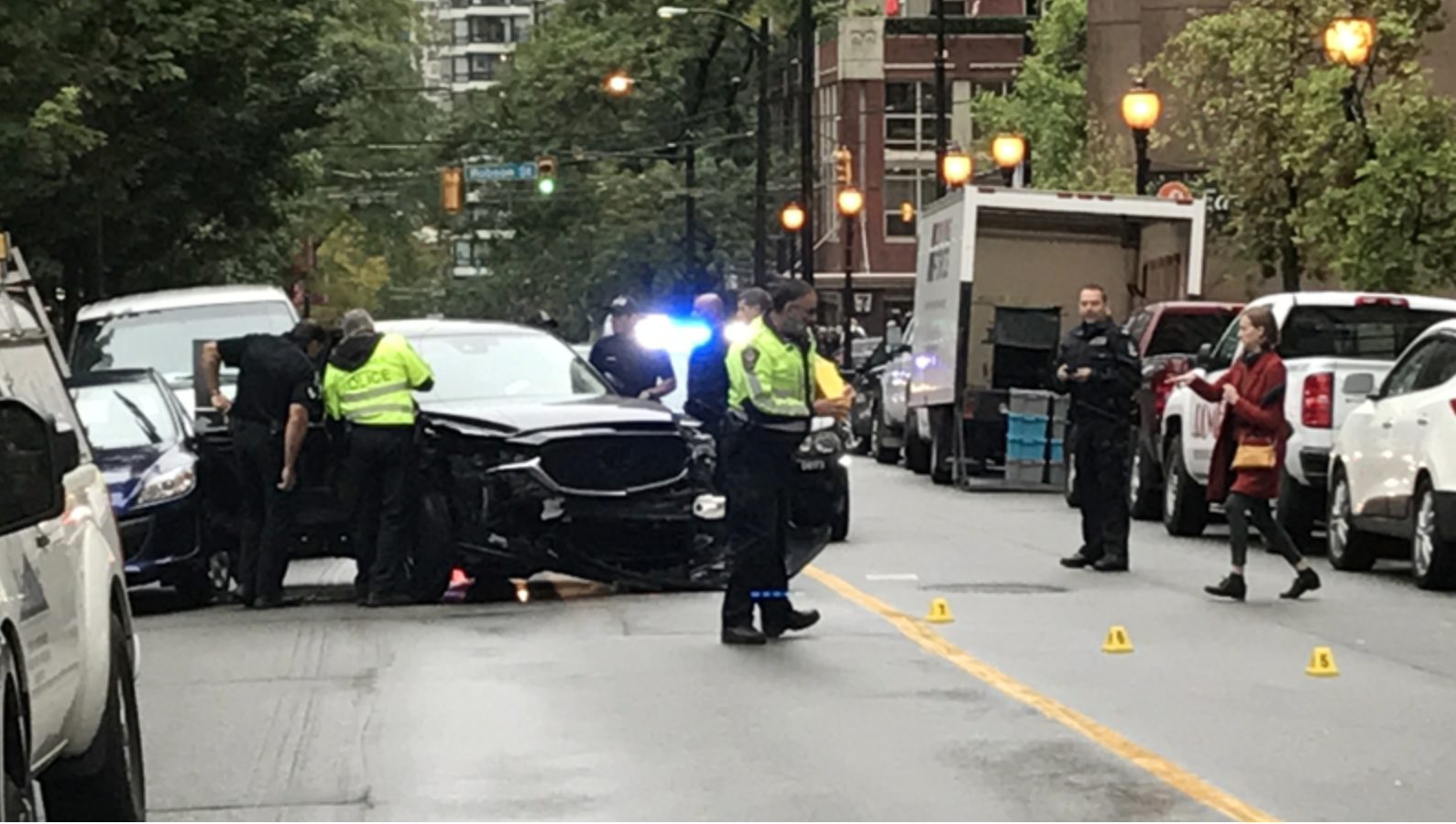 Police respond to an alleged carjacking and hit-and-run in downtown Vancouver.