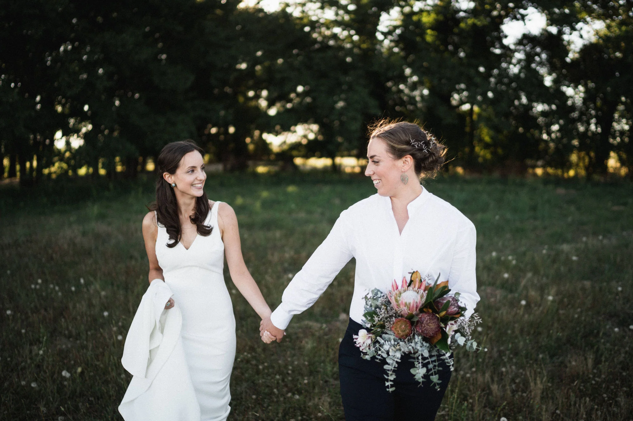 Action shot of Nic and Mil running back to their reception, to enjoy the cheese and produce spread provided by The Little Picnic Company . YUM! Photo credit: Thom Stewart