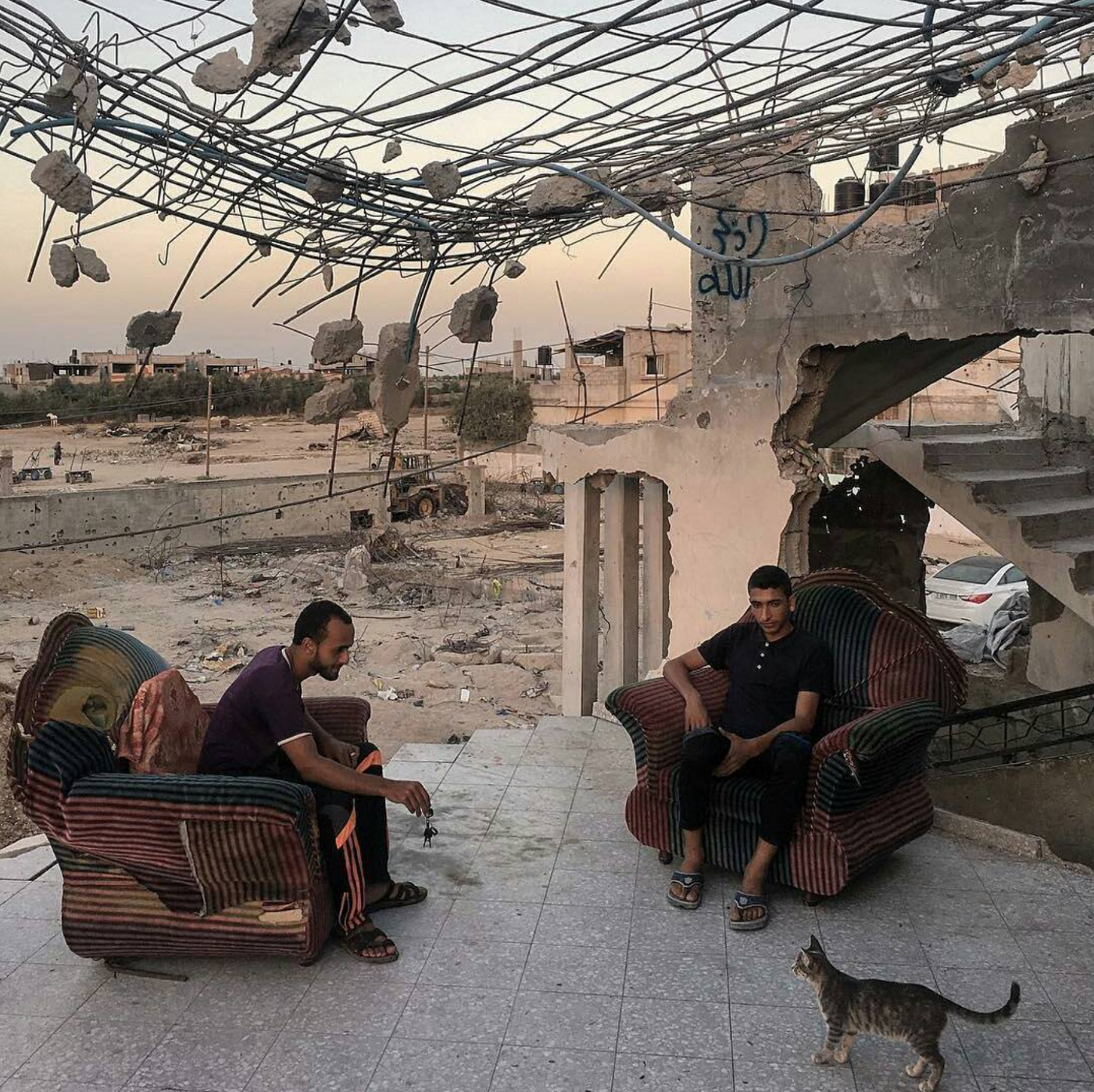Photo by @wissamgaza for @everydaygaza. “Palestinean youngsters sit in their destroyed family house, damaged during the Israeli-Hamas conflict of 2014, in the eastern Al Shejaetiya neighborhood of Gaza, October 13, 2016. According to UN reports, the…