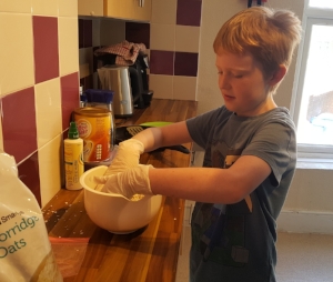Joseph (year 4) during a cooking session.