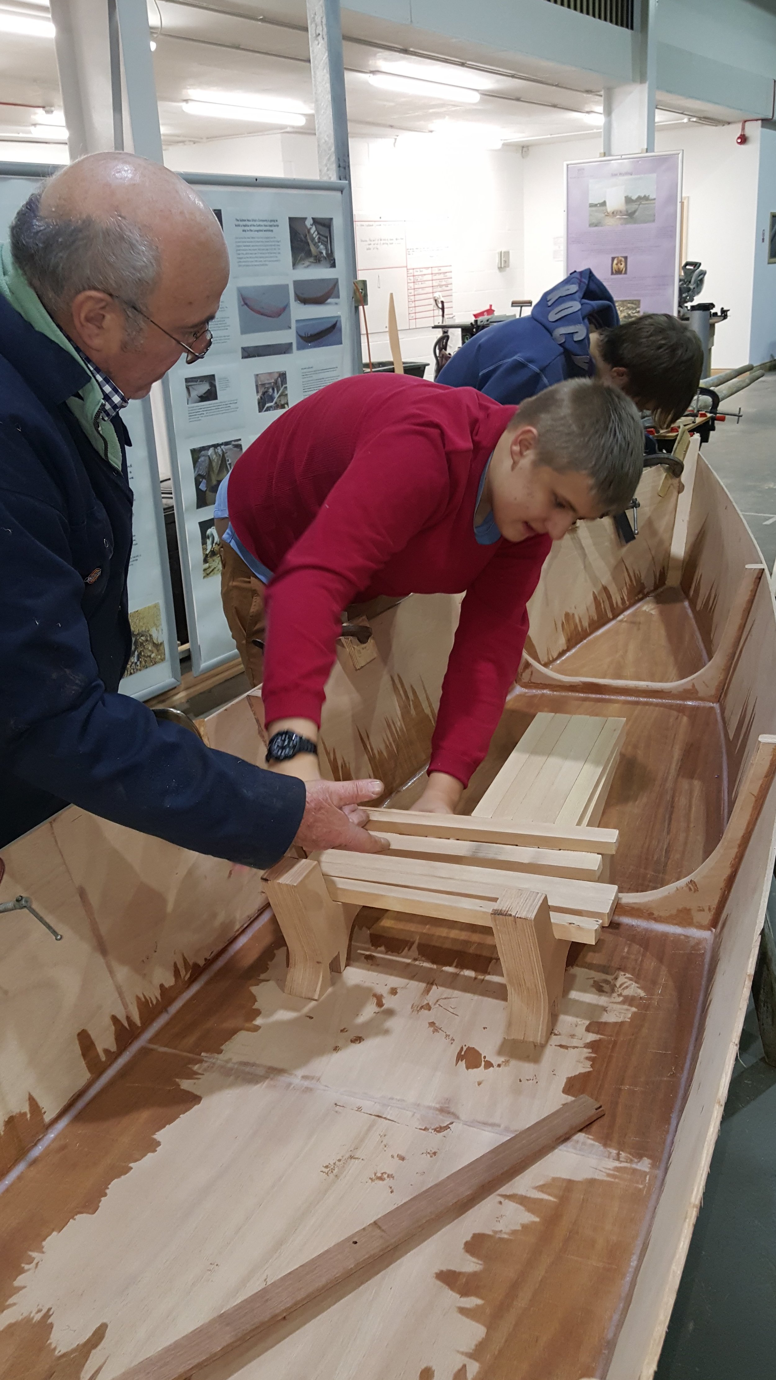Leo (year 11) working on the canoe building project, Woodbridge.