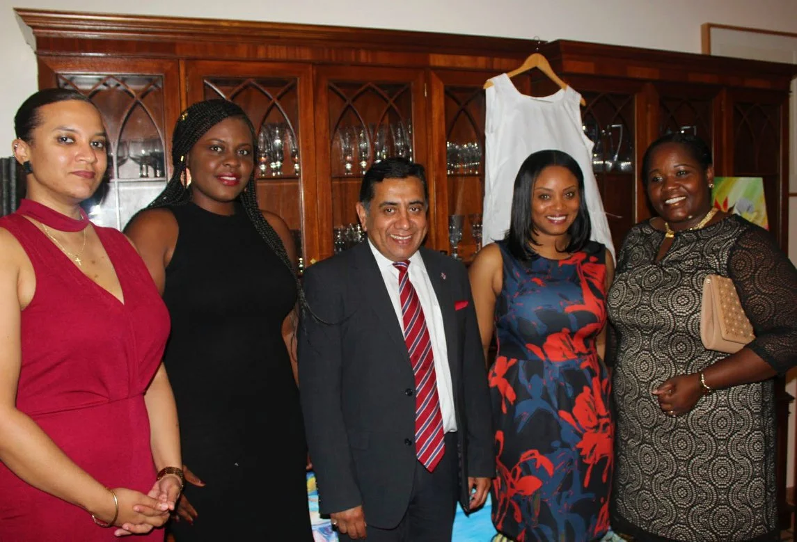 Lord Ahmad poses with Deputy Premier Hon. Delmaude Ryan and Chevening Alumni Photo Credit: HM Governor's Office 