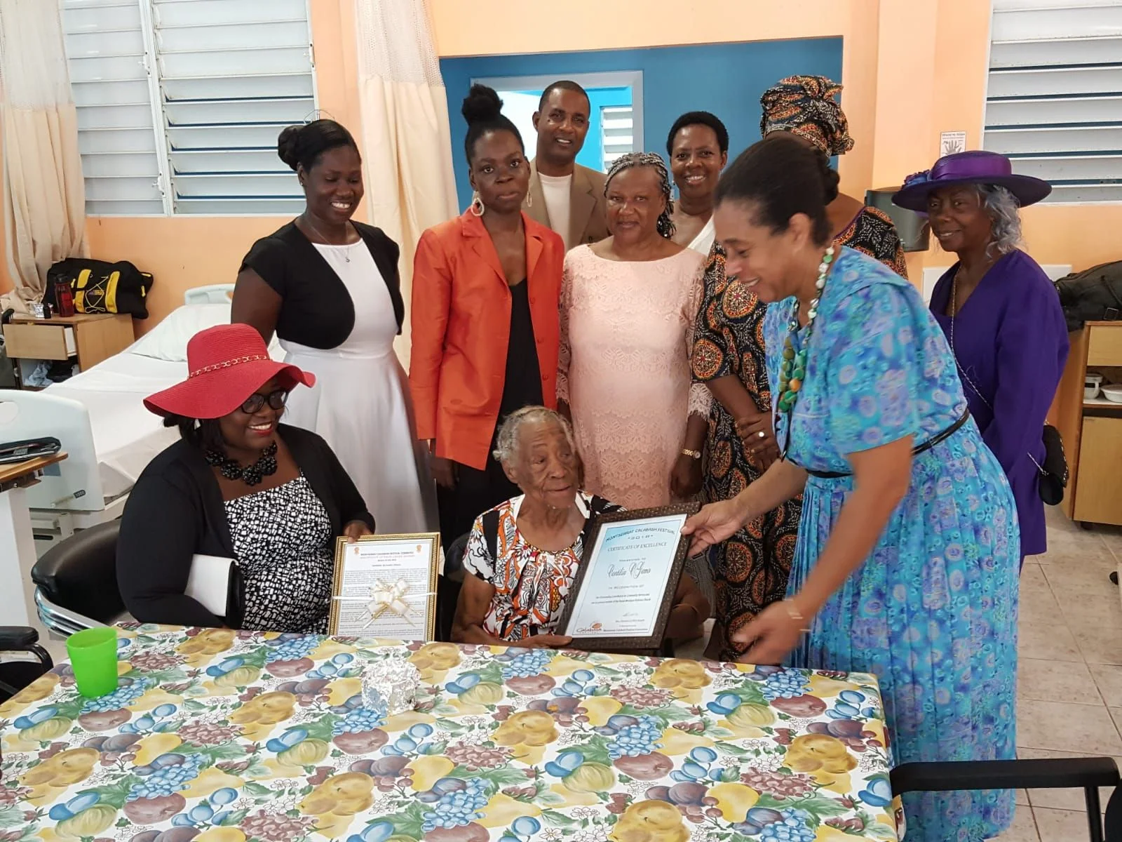 Mrs Cintelia O'garro with the Minister with responsibility for Culture and Members of the Calabash Committee 