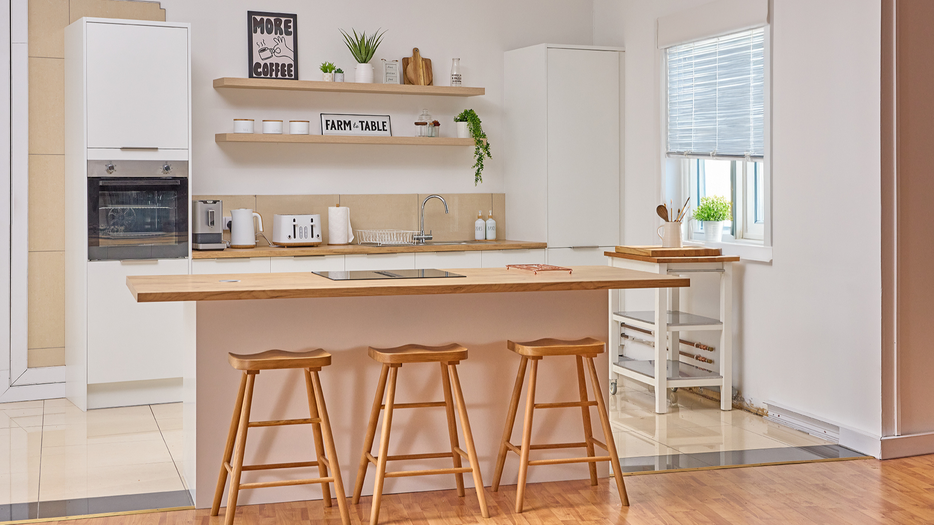 Still Hungry Studio Belfast food photography studio kitchen with three sash windows and props library
