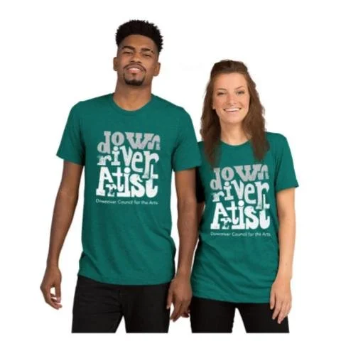 Support the Downriver Council for the Arts by snagging a one-of-a-kind t-shirt featuring original artwork created and donated by DCA member artists. Every shirt is more than just a piece of clothing&mdash;it&rsquo;s a statement of community, creativi