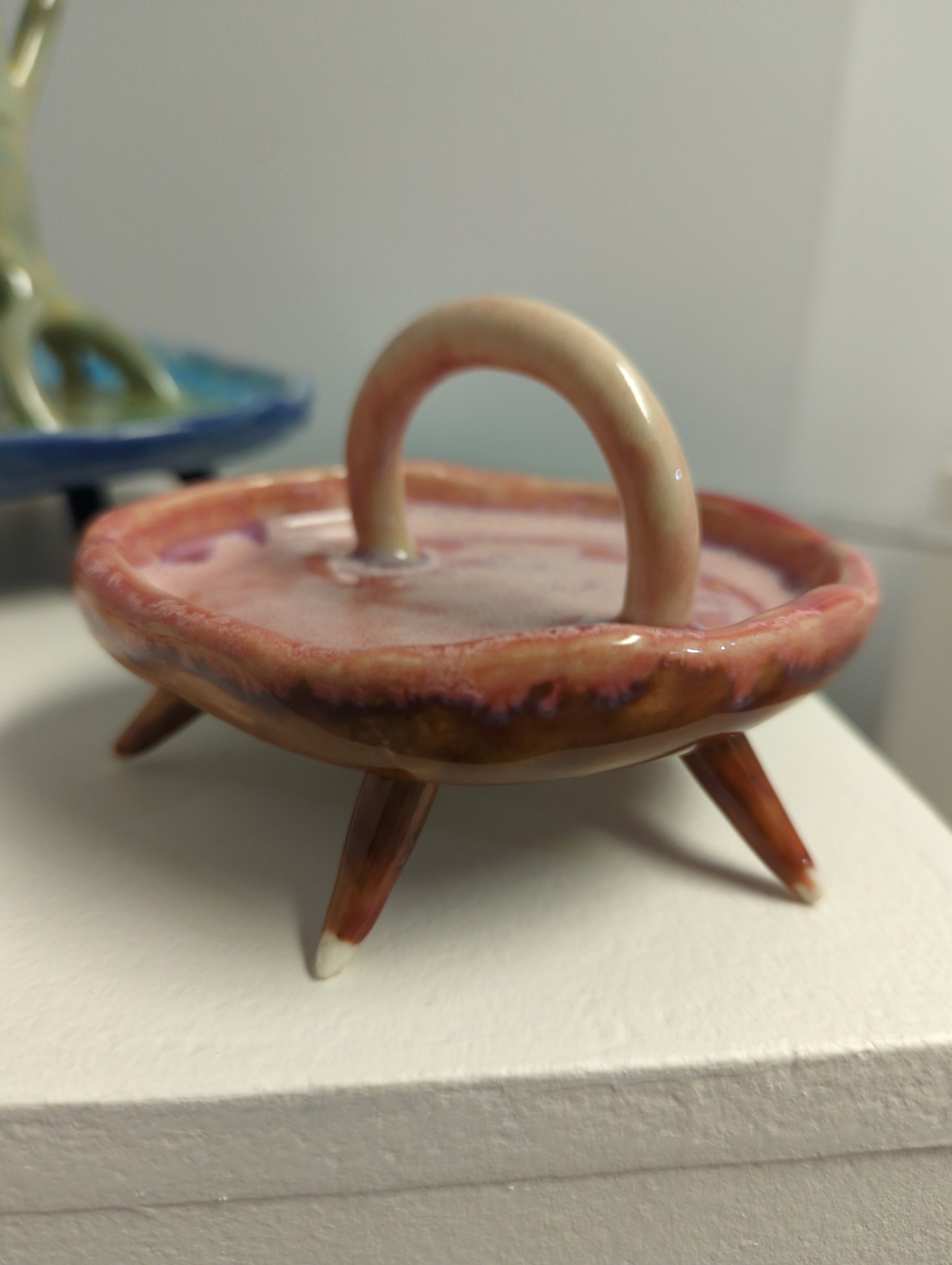 Spring Pool | Katie Russell | Ceramic | 4.5x4.5x3.5" | $35

Katie Russell is an artist living and working in Michigan currently focusing primarily in ceramic. She loves to dig in the dirt, both in the clay and in the garden, and the beauty of life sh