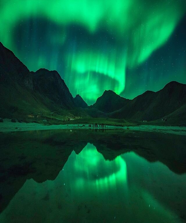 [ Northern Skies ]
.
A small pond of water at Haukland Beach worked perfect as foreground to capture the strong Aurora Borealis together with the mountains in the distance. A quite beautiful Autumn night in Lofoten, Northern Norway. A solar storm was