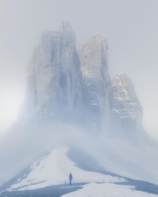 [ The Mist ]
.
I had the most amazing morning here at the Tre Cime di Lavaredo back in 2017. First of all we had some amazing light with beautiful colors from the sunrise and suddenly low clouds came in and created this misty scene!
These three peaks