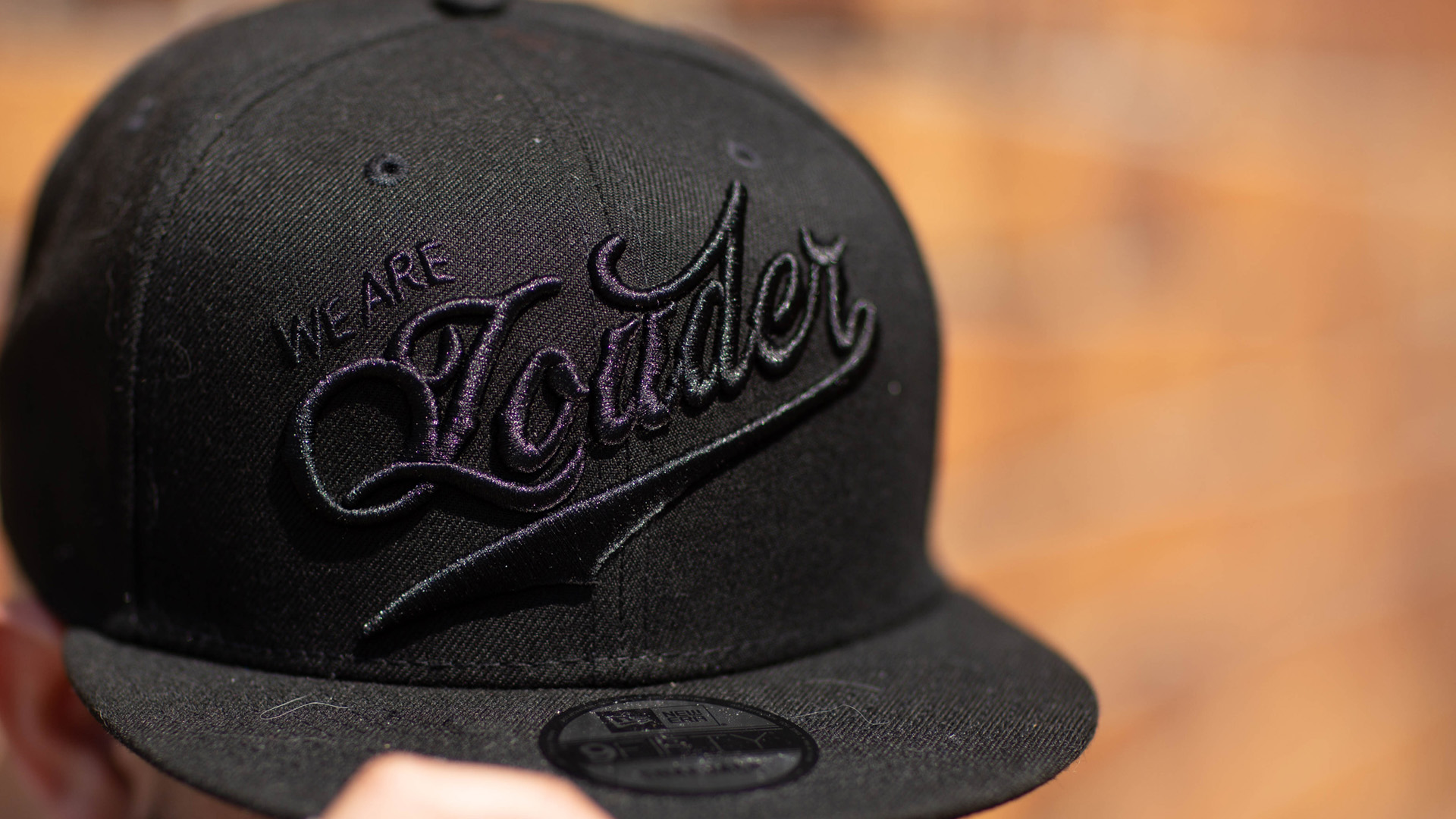 WeAreLouder_NewEra_Cap_marquee.jpg