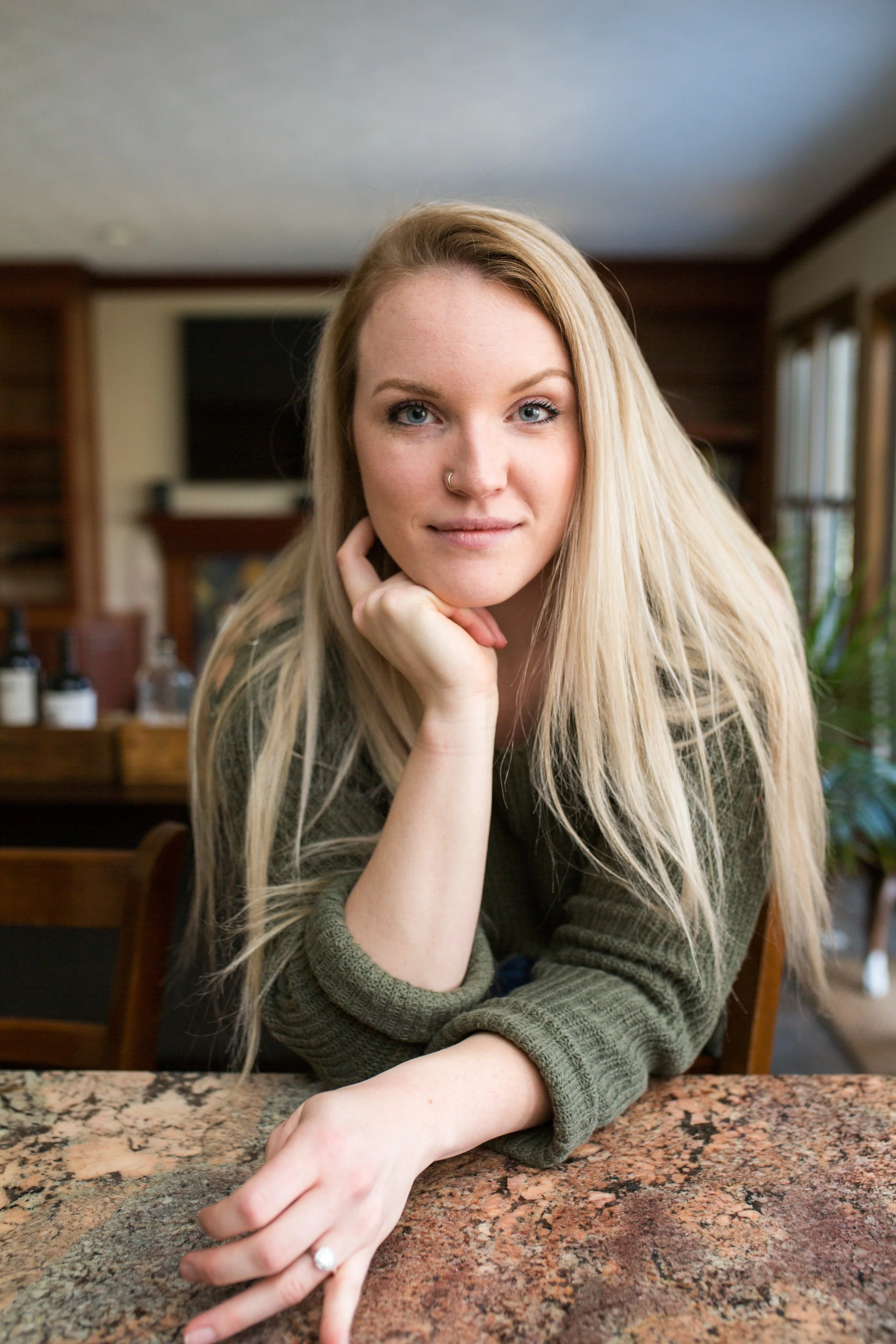 Mermaid hair and a slouchy green sweater, a match made in styling heaven.