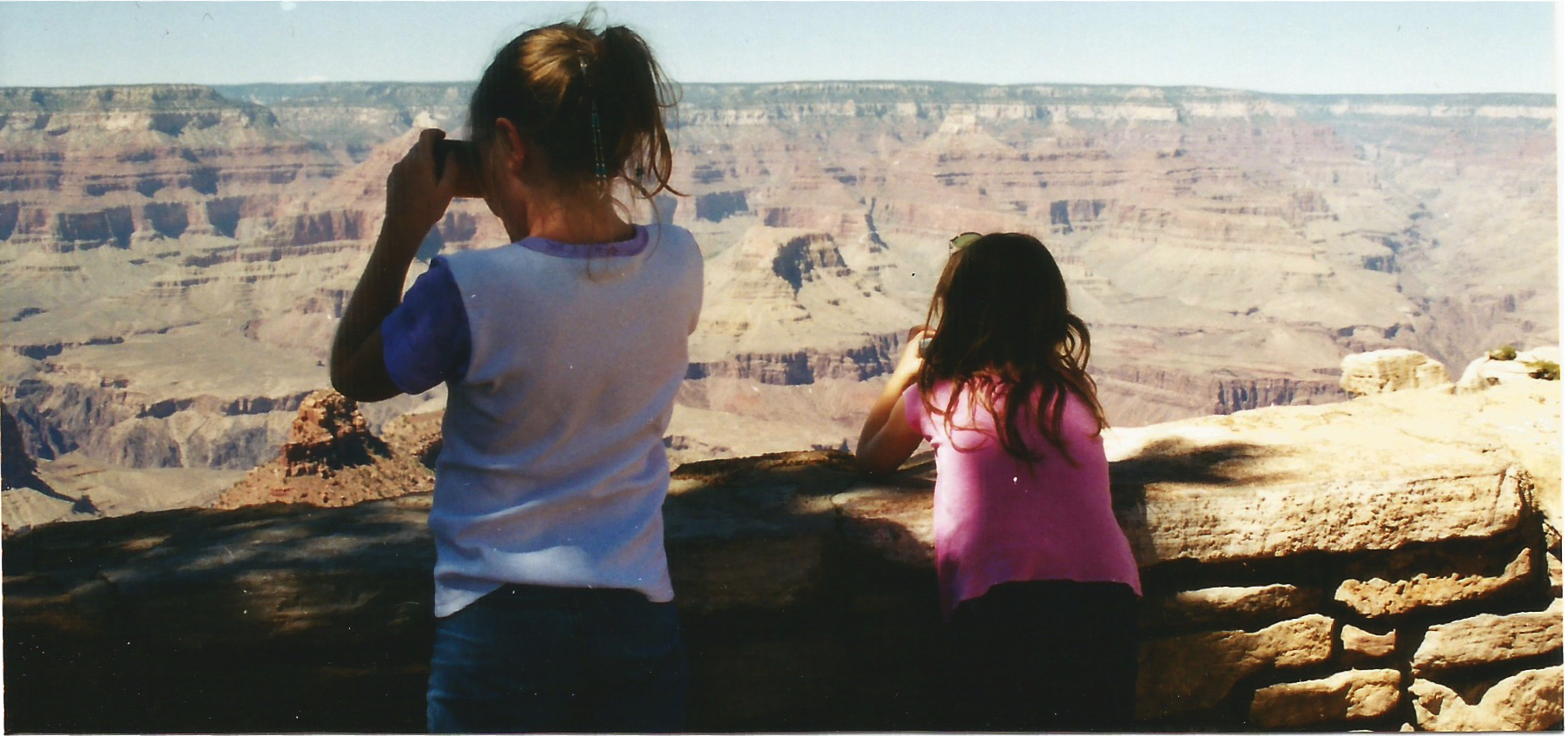 Caitlin and Emily look out at Grand Canyon.jpg
