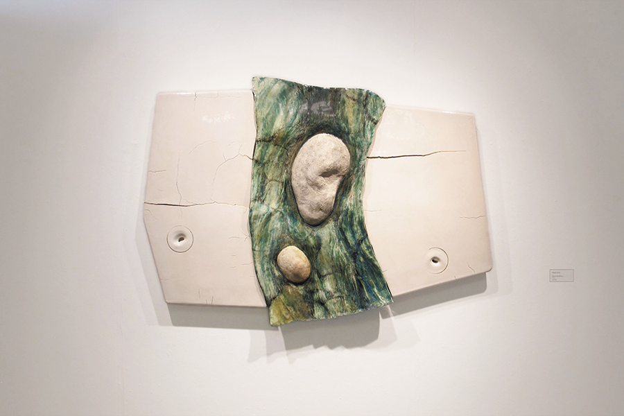   Hubris/Resilience,  2015, 40"h x 55"w x 9"d, slip-painted and glazed ceramic, resin, gold paint 