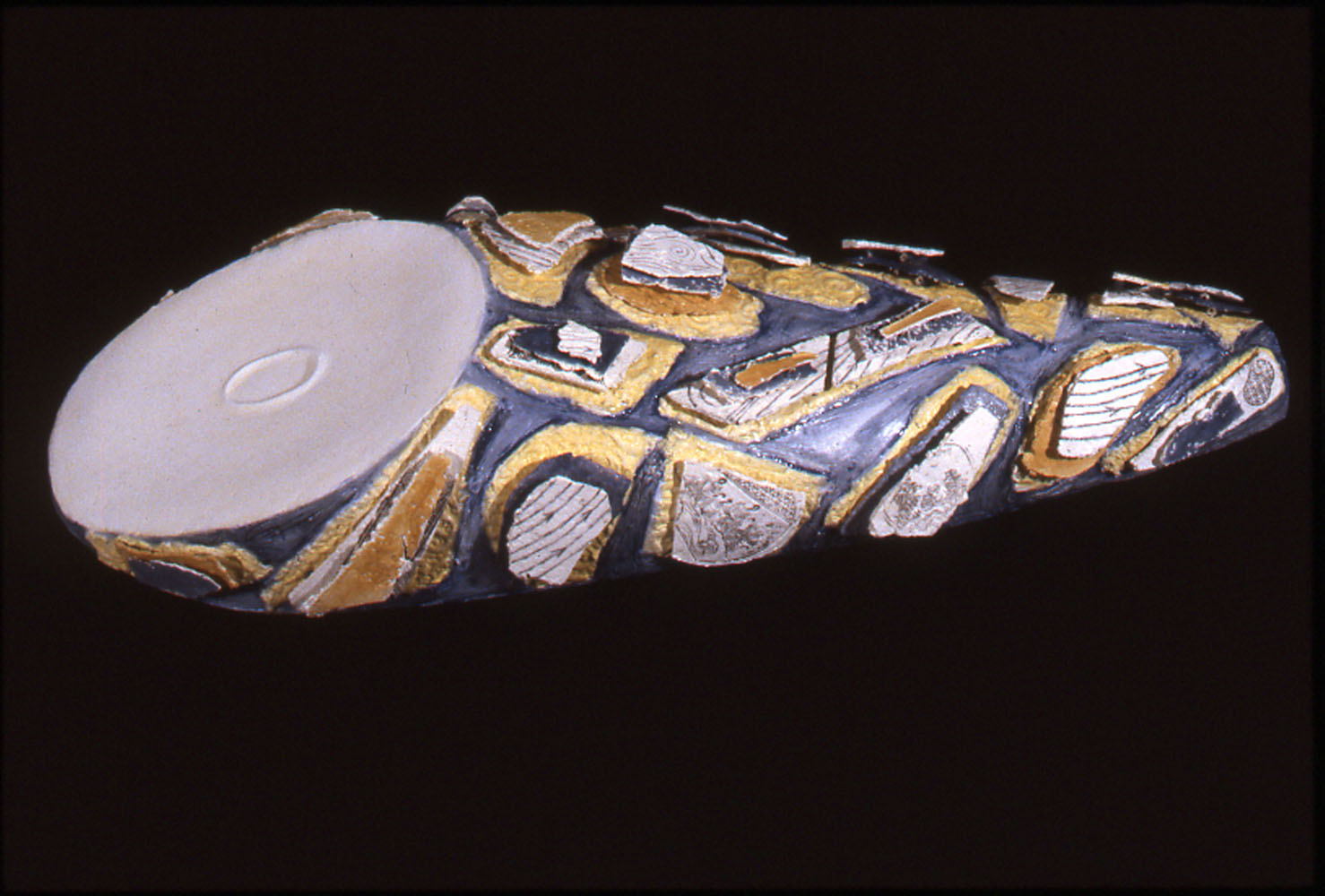    Seto Swirl,  1998, 44” x 17” x 8”, low-fire paper clay, stamped underglazes, glazes  