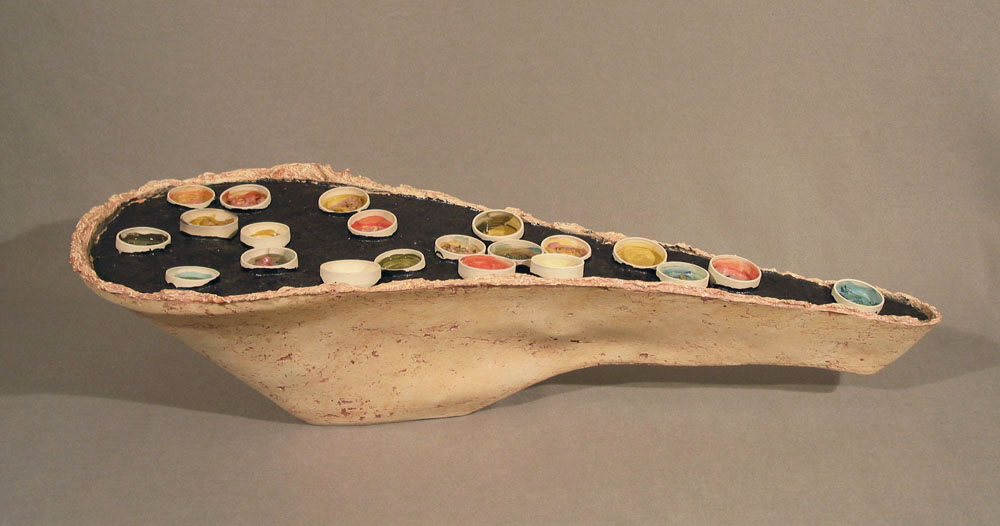    Collapse,  2009, 48.5”l x 20”w x 11.5”h, glazed stoneware paper clay, porcelain, fired glaze sediments  