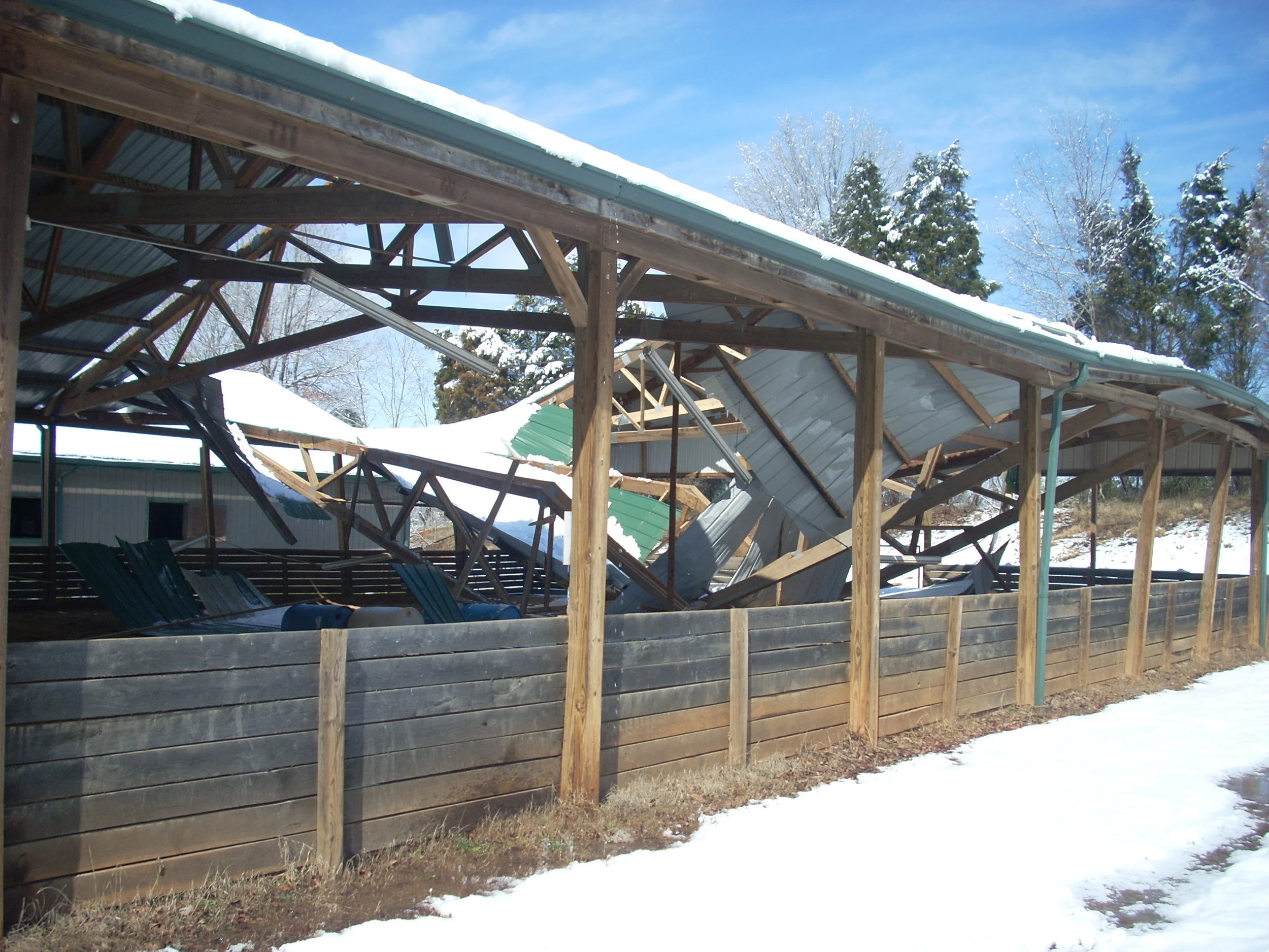 Roof collapse in the Large Covered Arena during a snow because arenas were not constructed to code before we moved in.