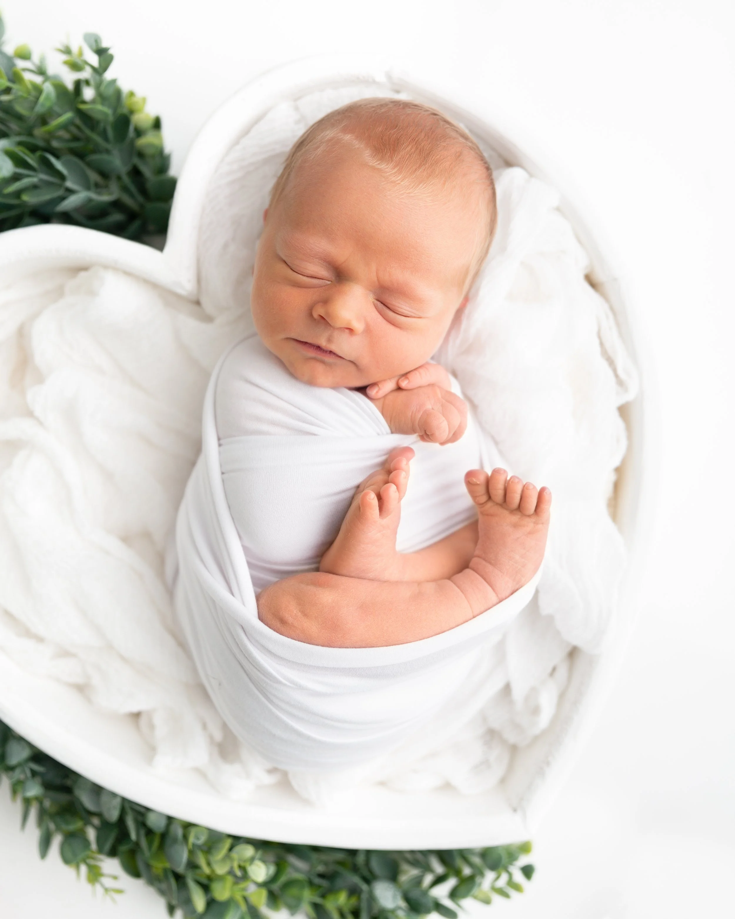 Newborn Nolan: wrapped up tight