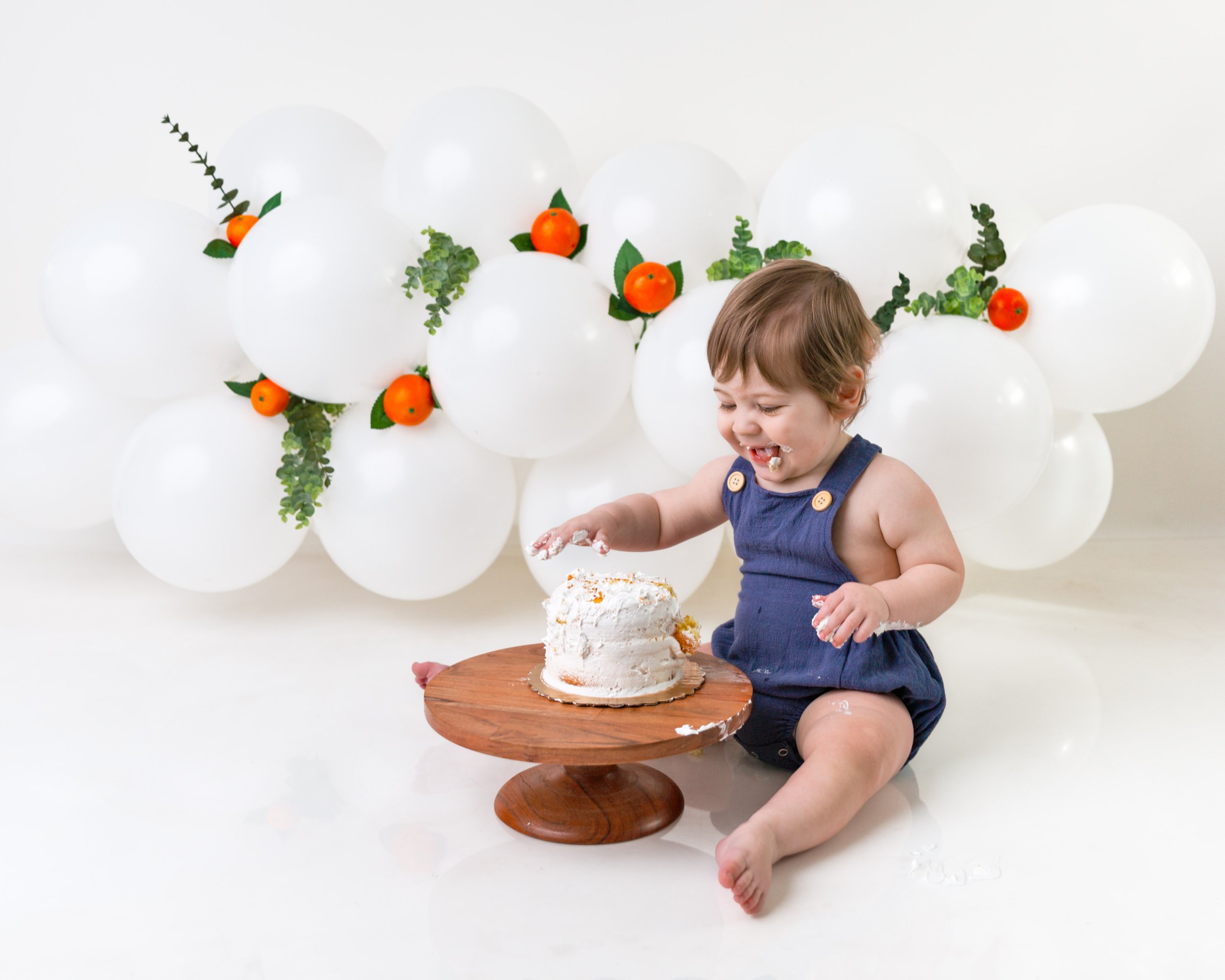 Cake-smash-photos-first-birthday-photoshoot-one-year-old-newborn-photography-spokane-washington-8.jpg