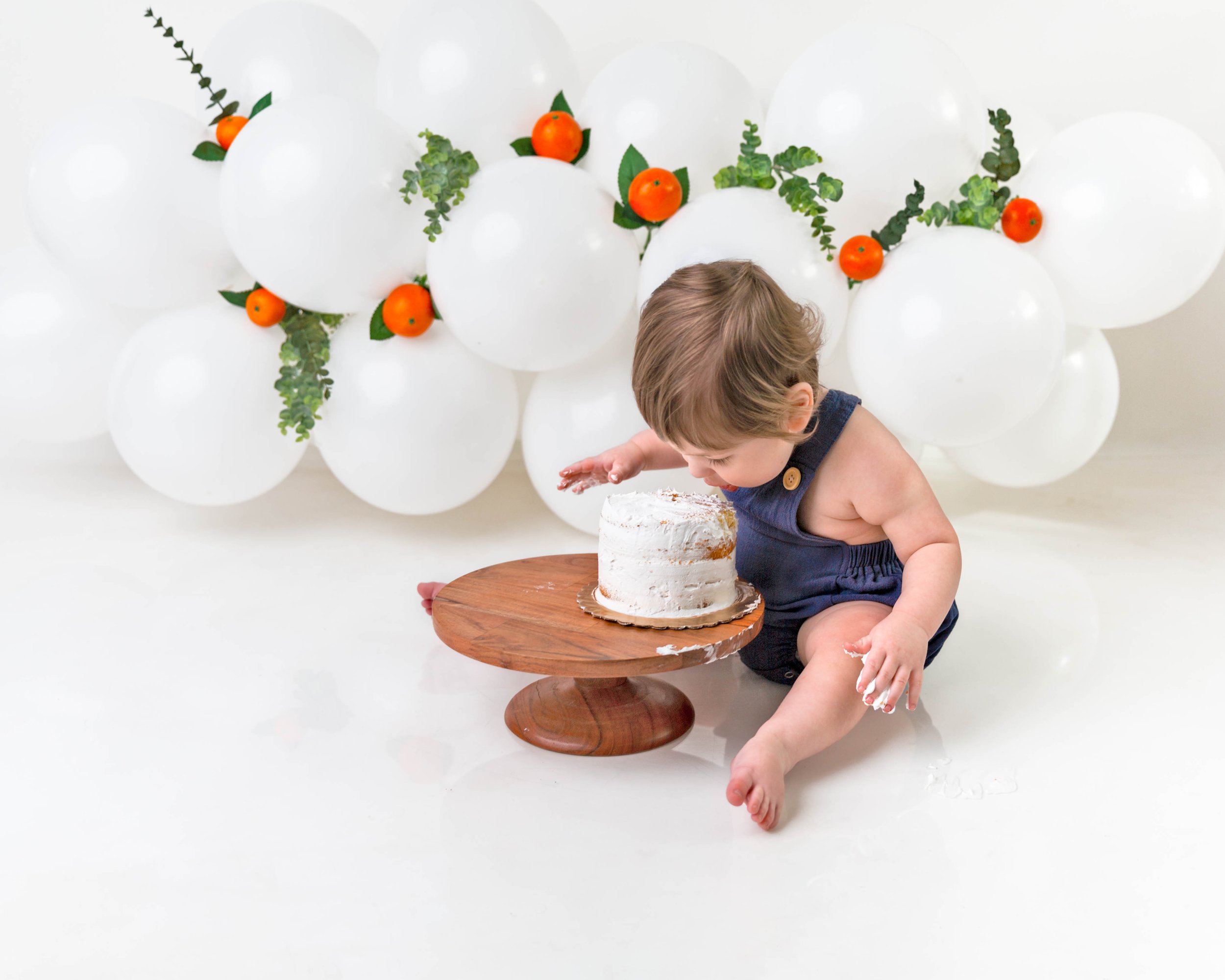 Cake-smash-photos-first-birthday-photoshoot-one-year-old-newborn-photography-spokane-washington-7.jpg