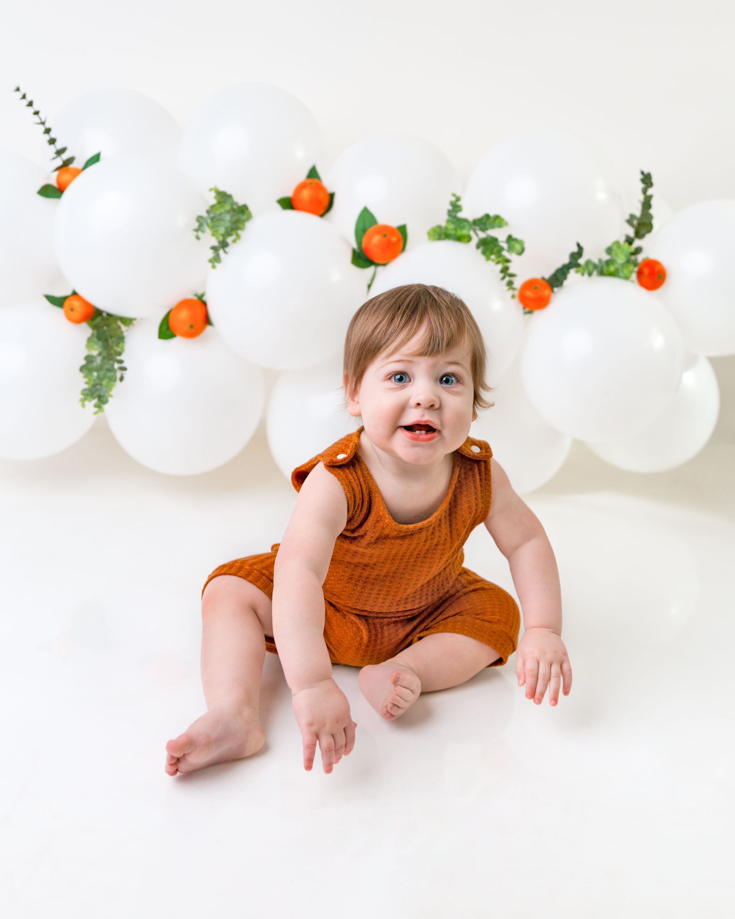 Cake-smash-photos-first-birthday-photoshoot-one-year-old-newborn-photography-spokane-washington.jpg