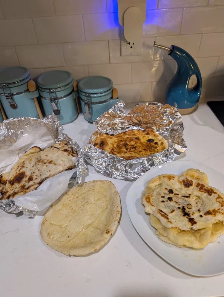 restaurant naan, pizza oven naan, cast-iron skillet naan, and sad grocery store naan