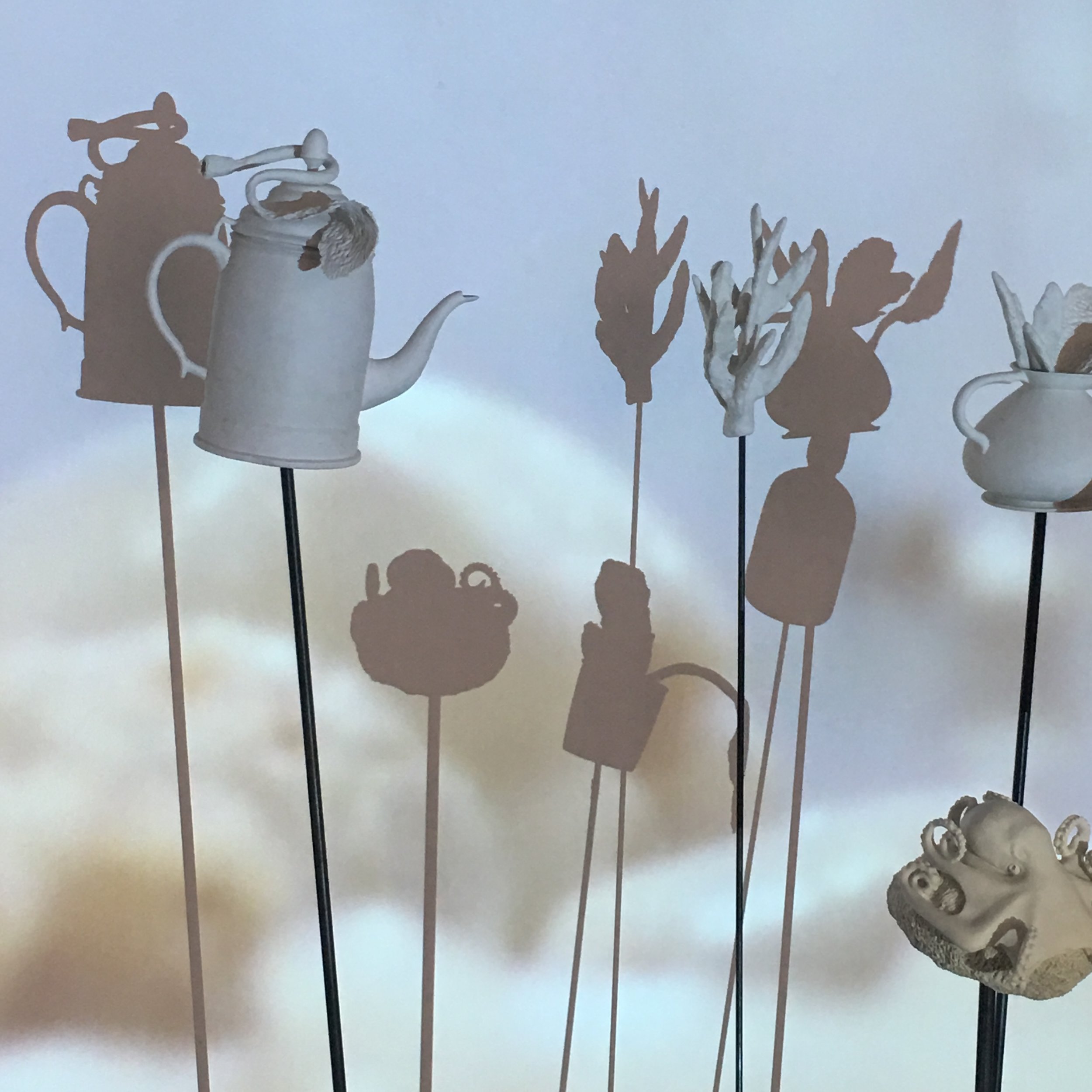  Carol Hudson  Intertidal Video , 2018. Video projection over porcelain objects mounted on steel rods. 270 x 300 cm. 