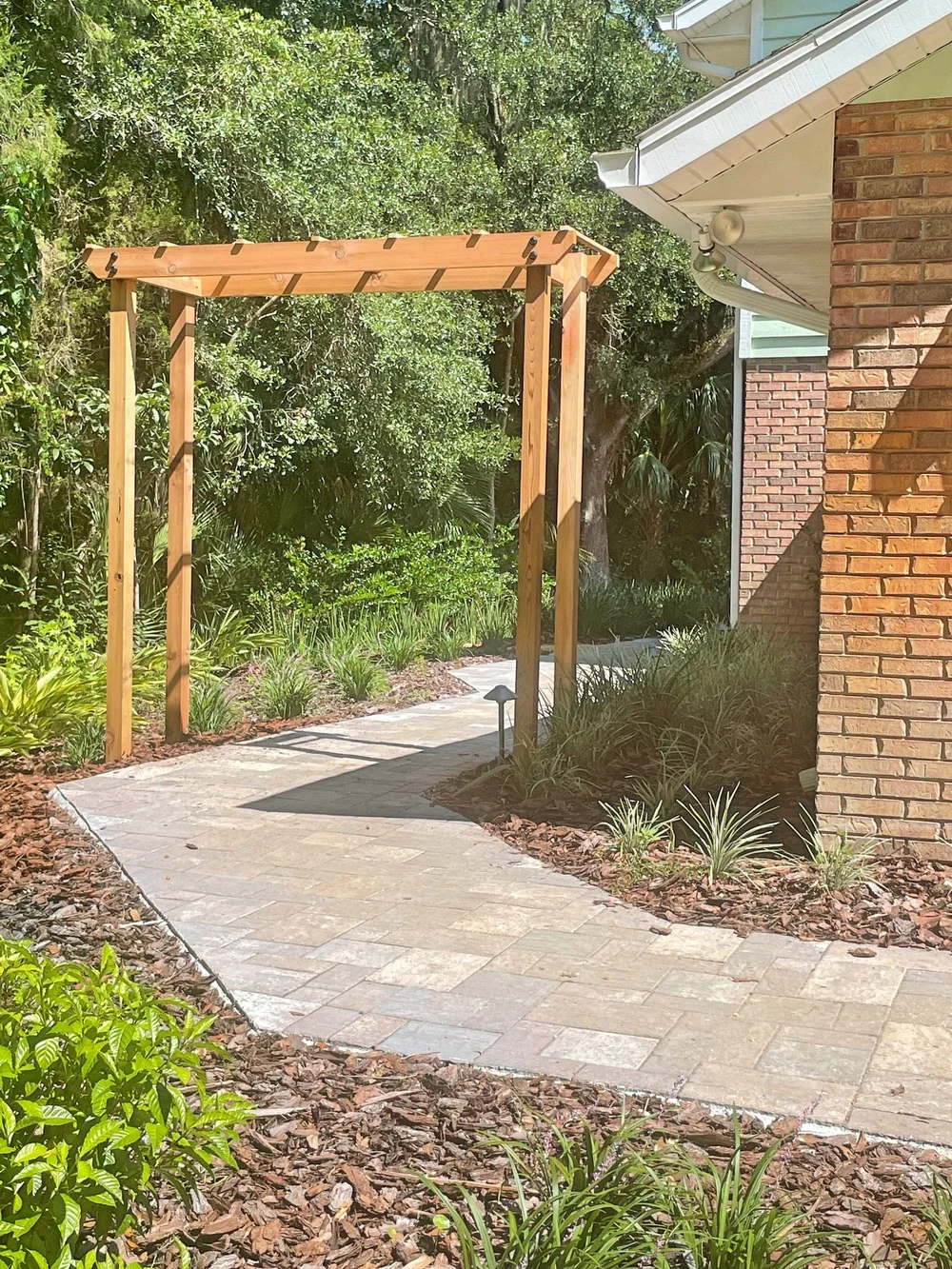 arbor_custom_paver_path_landscape_design_sanford_osteen_fl_earthwise.jpg