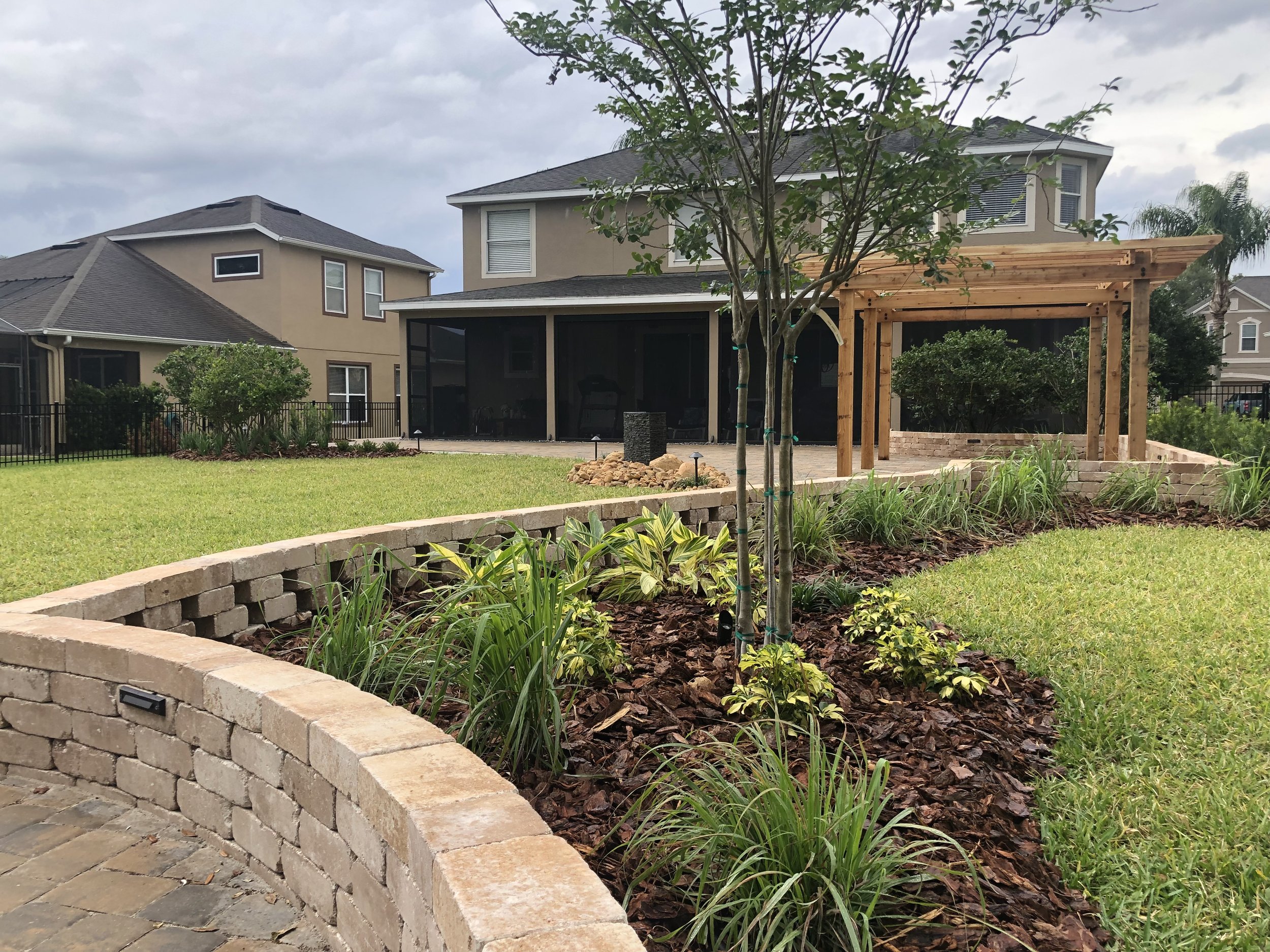 landscape_design_earthwise_horticultural_services_orlando_longwood_sanford_winter_springs_pergola_pavers_retaining_wall_florida.jpg