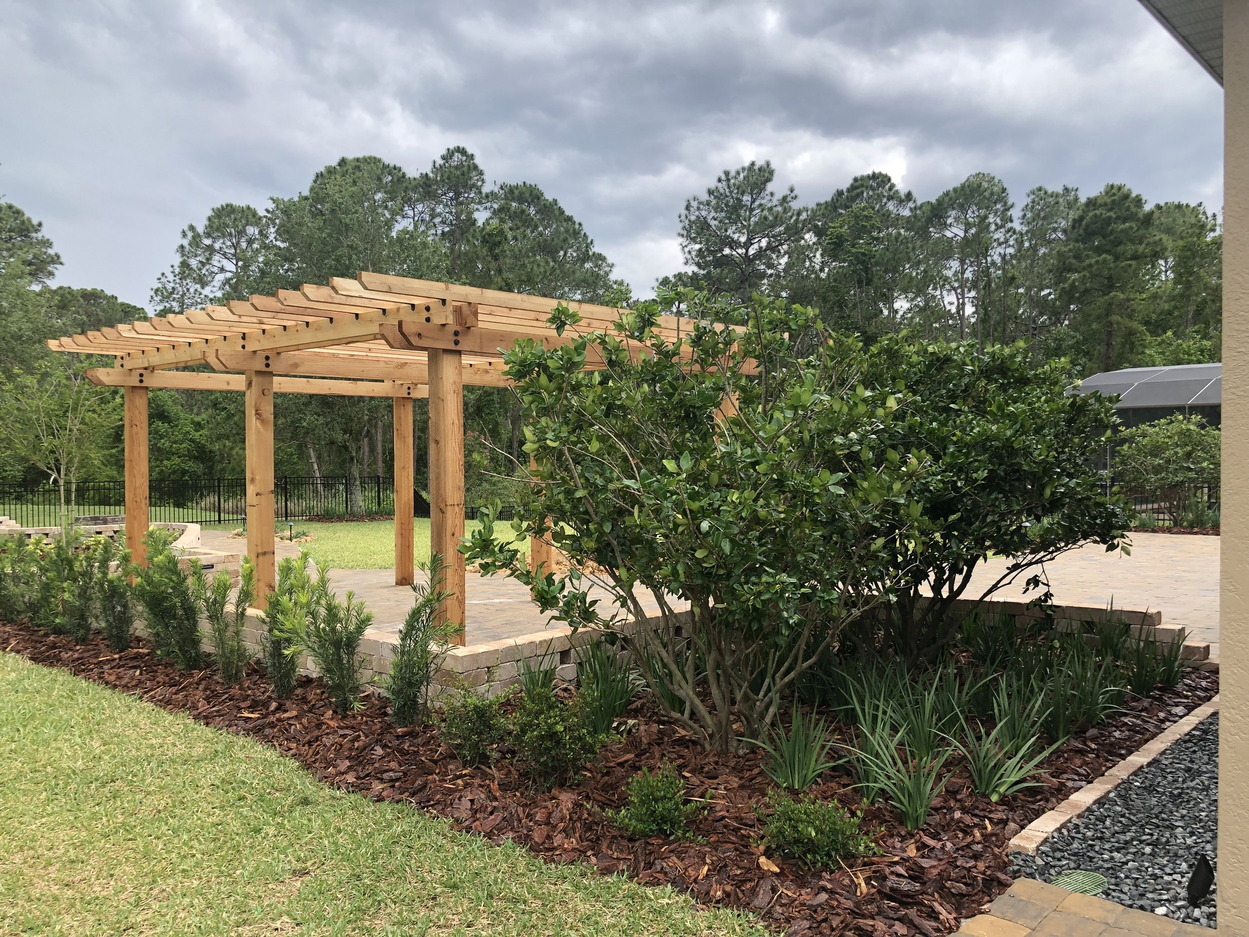 landscape_design_earthwise_horticultural_services_orlando_oviedo_sanford_winter_springs_pergola_pavers_retaining_wall_florida.jpg