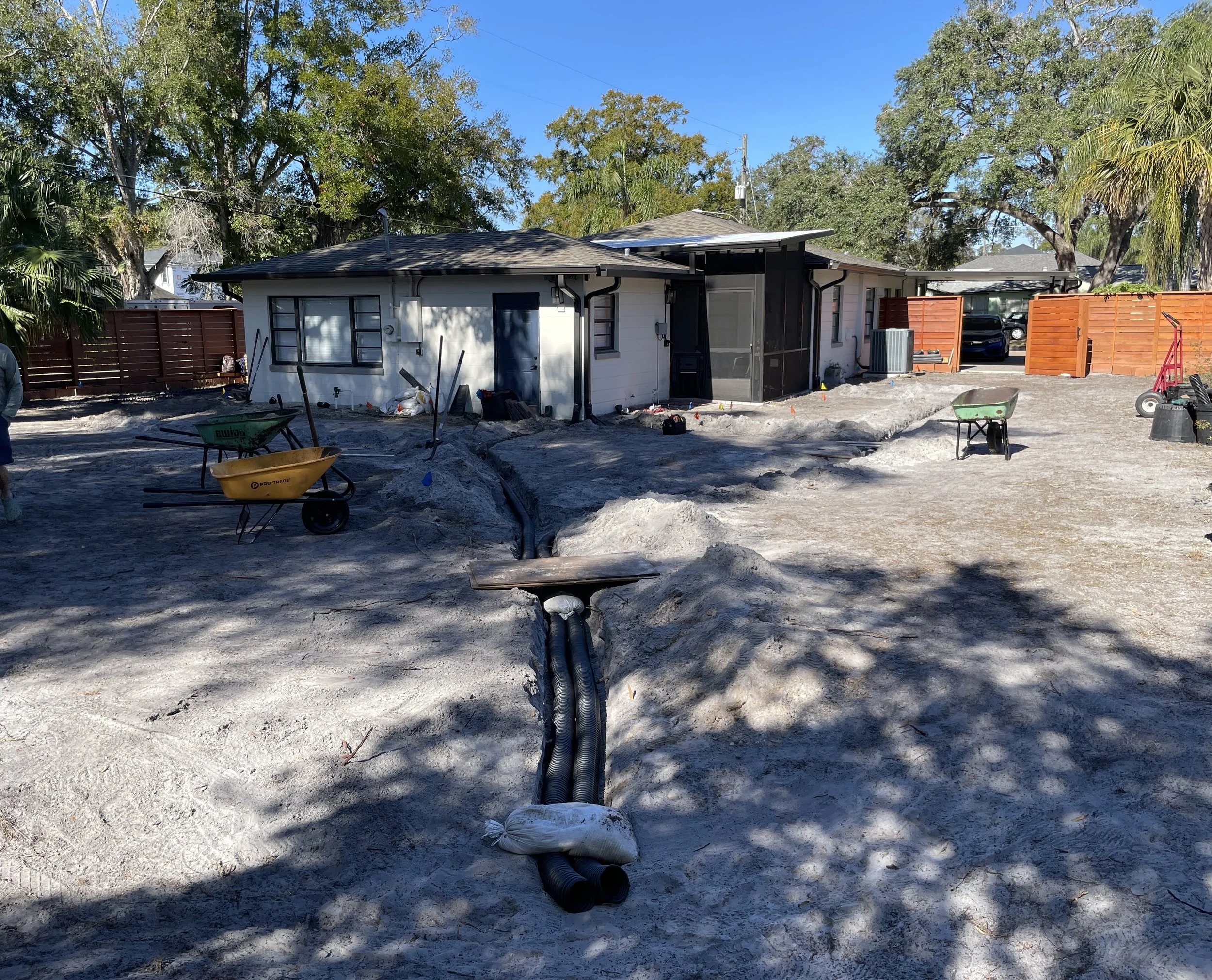 backyard drainage system installation during a landscape design project in Orlando Winter Park Fl earthwise horticultural.JPG
