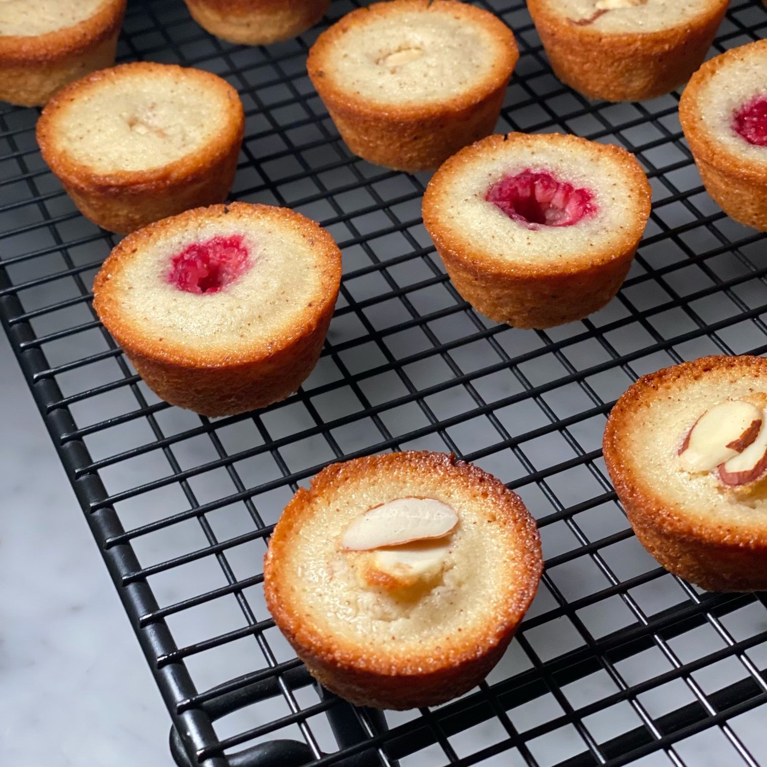 Financiers topped with Raspberries or Almond Slices $22.50/dozen