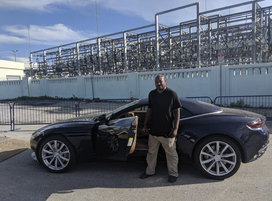 Steve Bryant in front of transported car