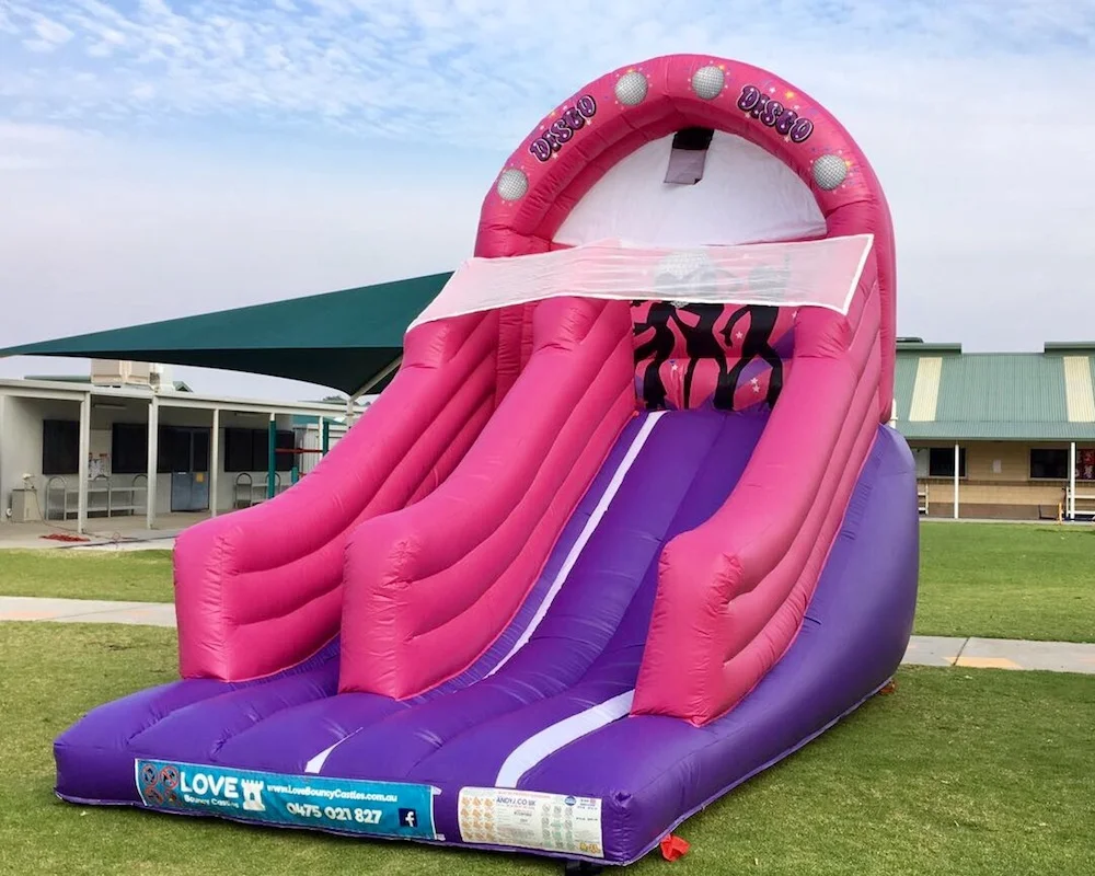 Pink Disco bouncy castle super slide hire 3