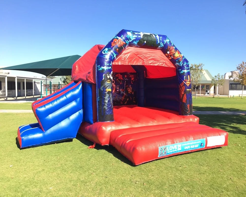 Super heros bouncy castle hire with slide Rockingham