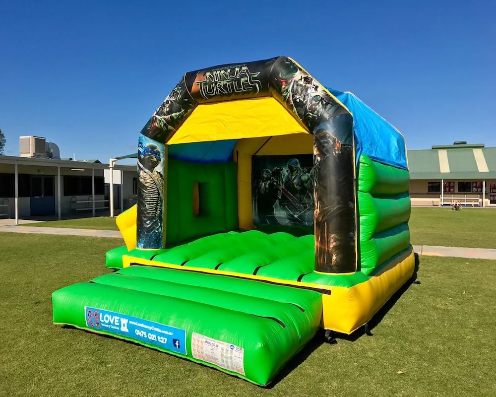 Teenage Mutant Ninja Turtles bouncy castle hire with slide Rockingham