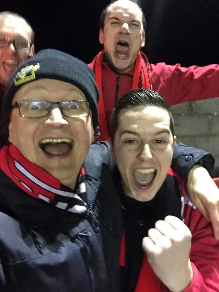 Between the Stripes LOI podcast co-hosts, Kieran Burke (lower right) and Jon Brier (lower left) celebrate with Section O after Longford Town’s 2-0 home win over Shelbourne scooped the pair over €700 each!