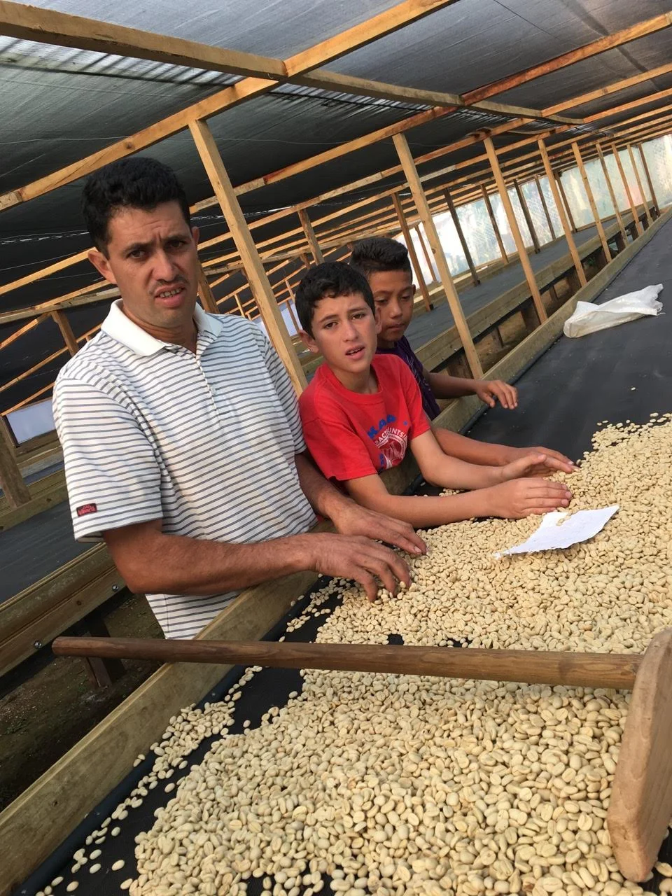 Mario Moreno w/ his new drying beds now with shade
