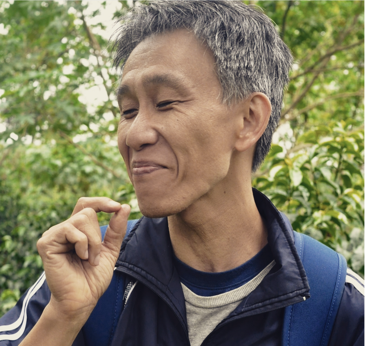 Sidney Kao tries the fruit of a Gesha coffee cherry for the first time. 