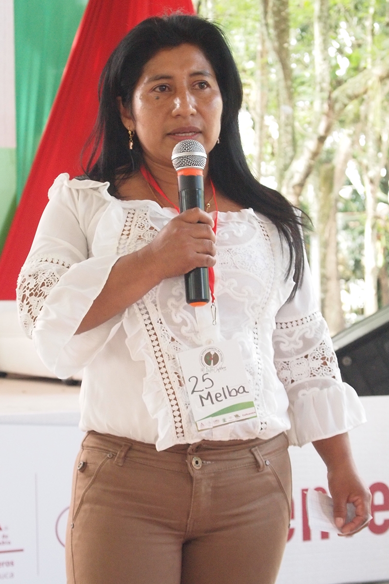 Melba Guainás Bubú, indigenous producer from Florida, Valle del Cauca, presents her coffee during the Business Round. Melba's coffee placed third in the Valle Cafetero competition, 2018.&nbsp; 