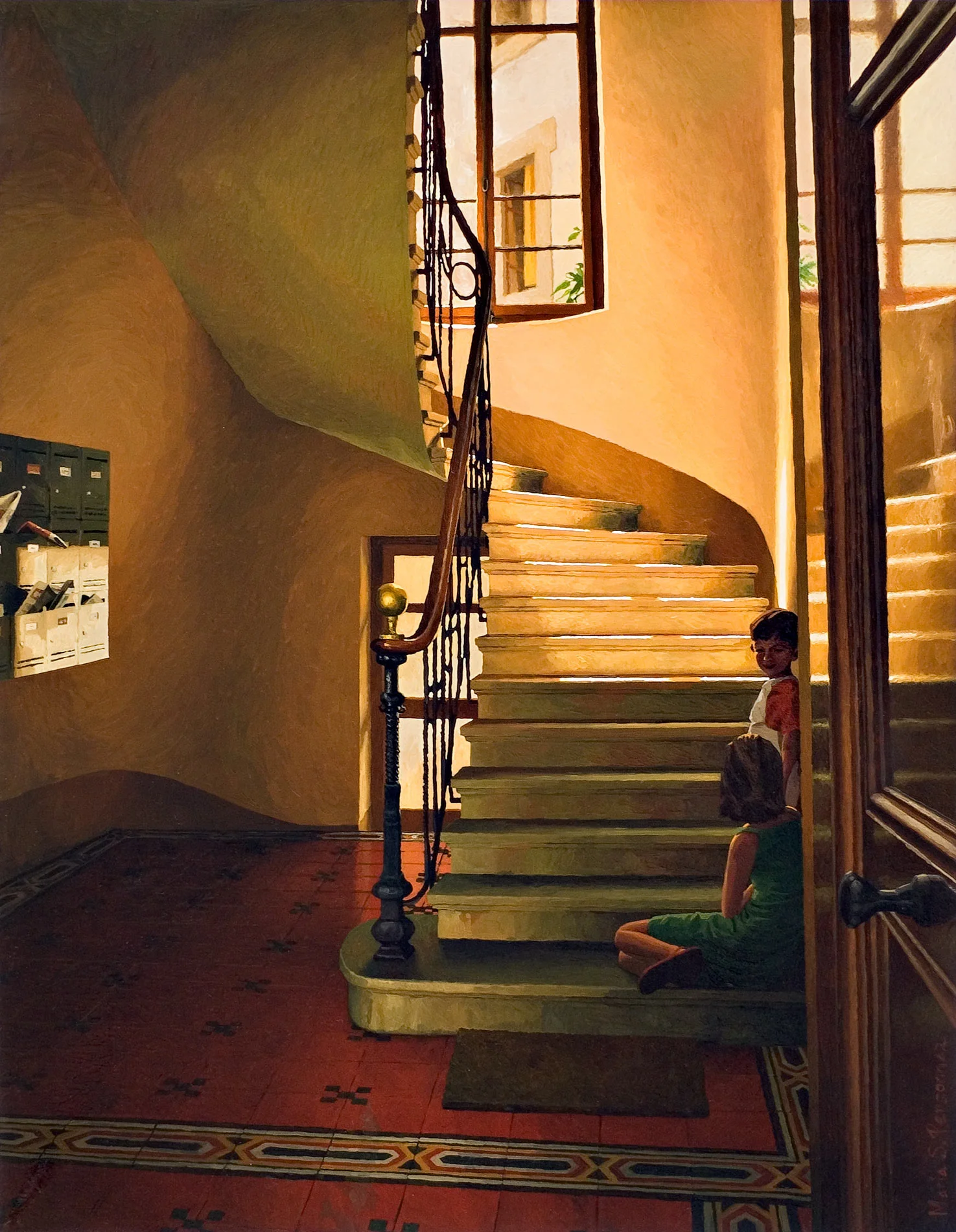 A building entrance hall with a red floor