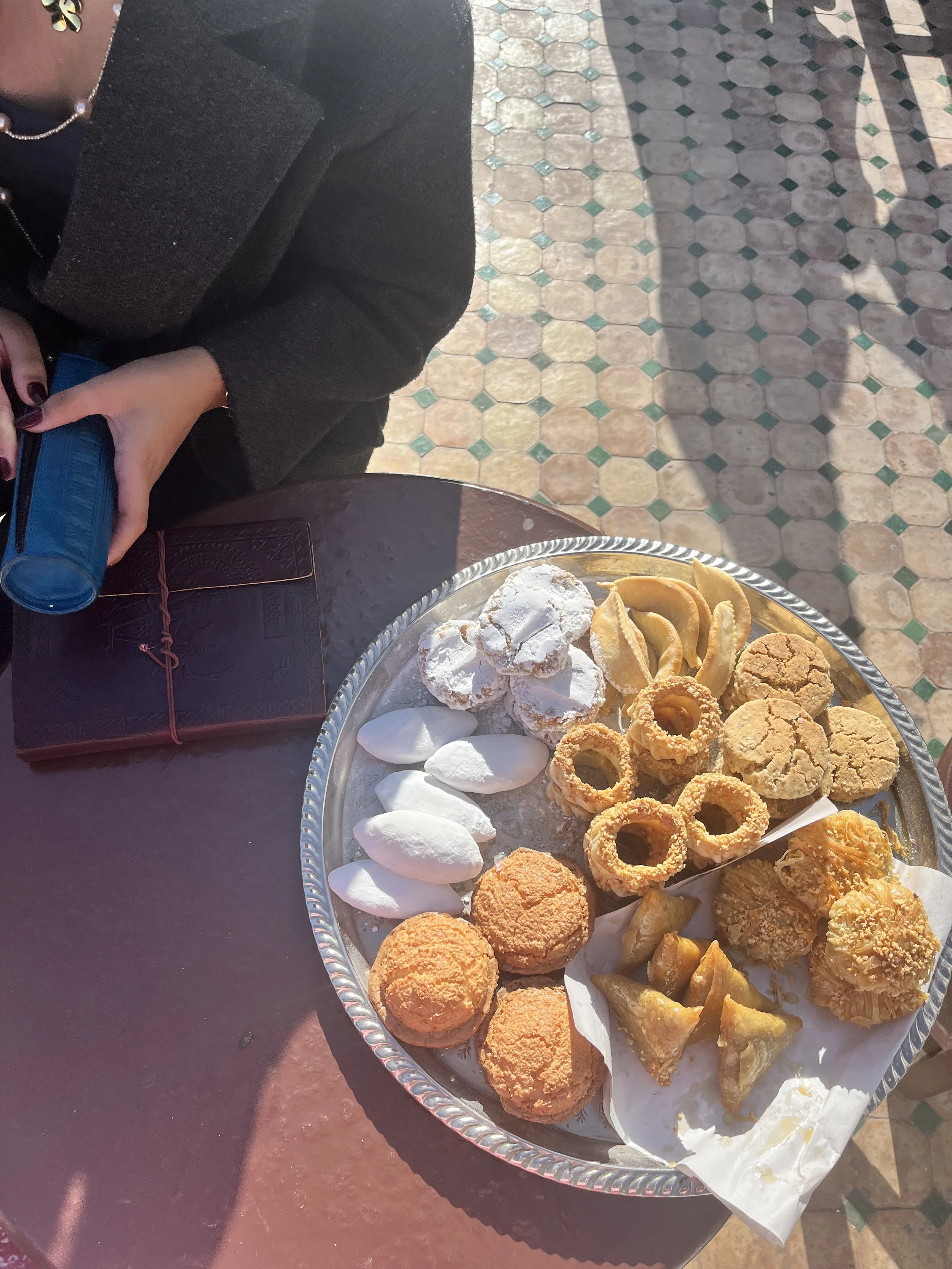 A tray of various cookies and sweets.