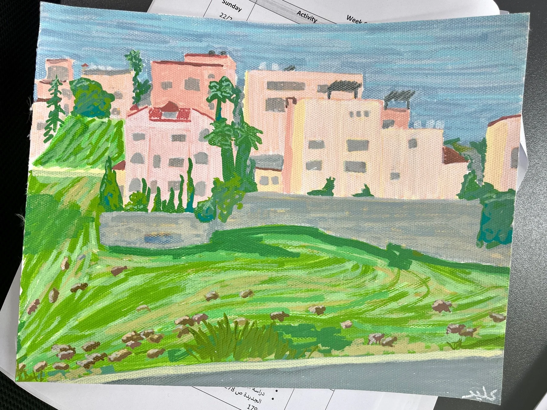 A painting of sheep on a grassy hill with homes at the top.