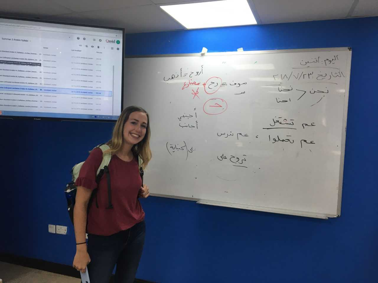  My classmate, Hannah, poses by the Ammiya board after class. Photo credit: Russ, 2018